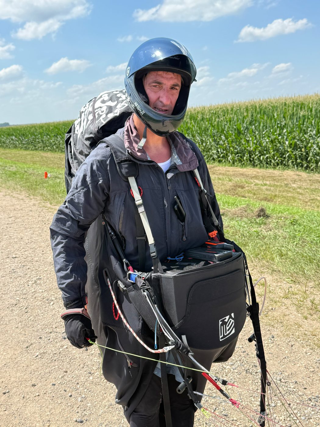 A pilot in full-face helmet on the retrieve walk